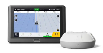 A Raven precision agriculture guidance display screen showing a field map alongside its circular GPS receiver unit.